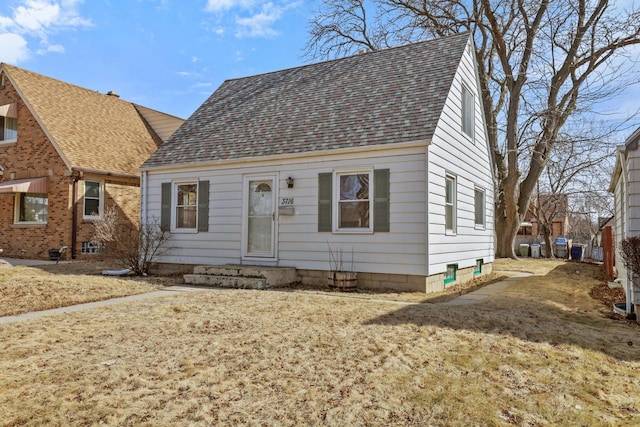 view of front of home with roof with shingles