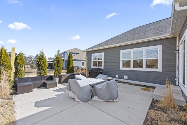 view of patio featuring area for grilling, outdoor lounge area, and fence