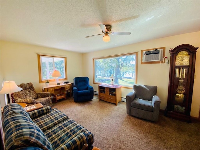 carpeted living room with a wall unit AC, a ceiling fan, baseboard heating, and a textured ceiling