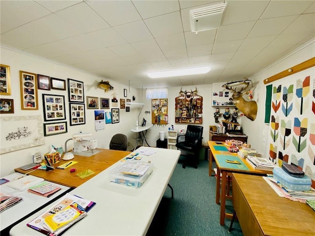 office space with visible vents, carpet, and ornamental molding