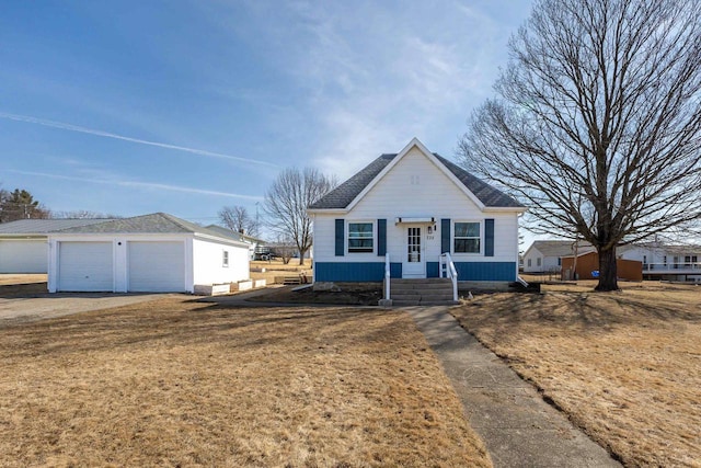 view of front of house featuring an outbuilding