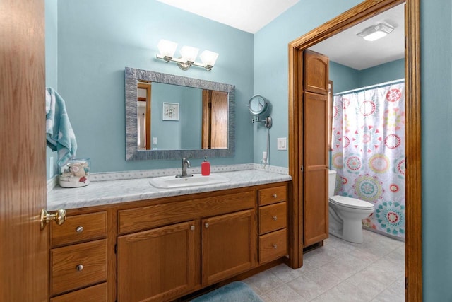 bathroom with vanity, toilet, and a shower with curtain