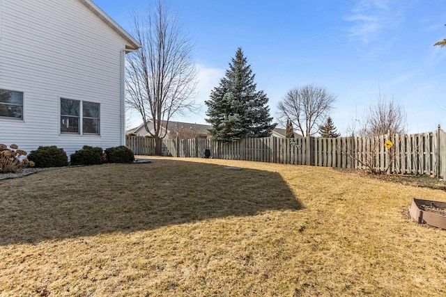 view of yard featuring a fenced backyard