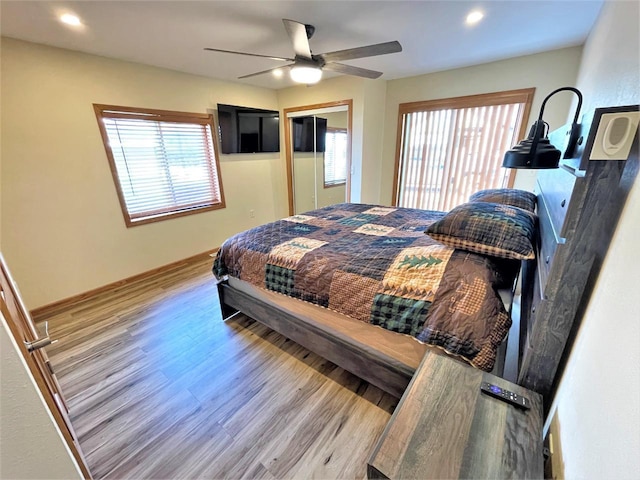 bedroom featuring recessed lighting, a ceiling fan, baseboards, and wood finished floors