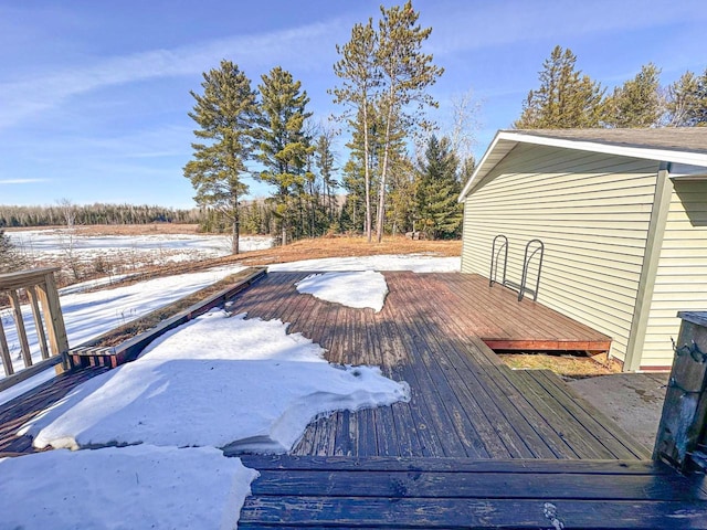 view of snow covered deck