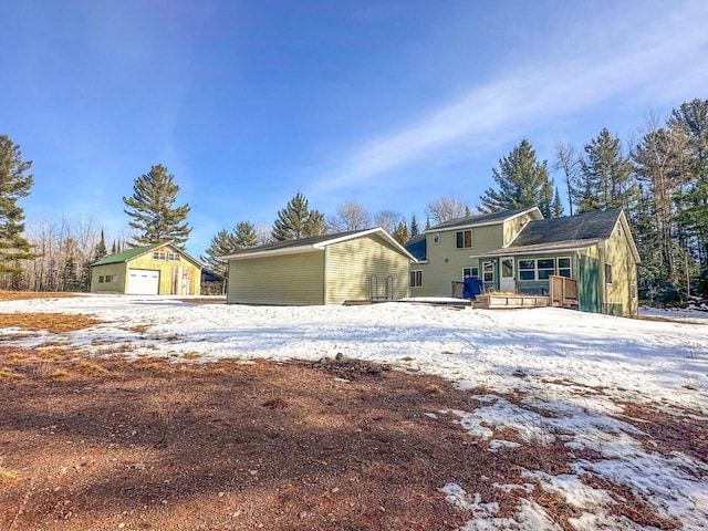 view of front of house featuring an outbuilding and a garage