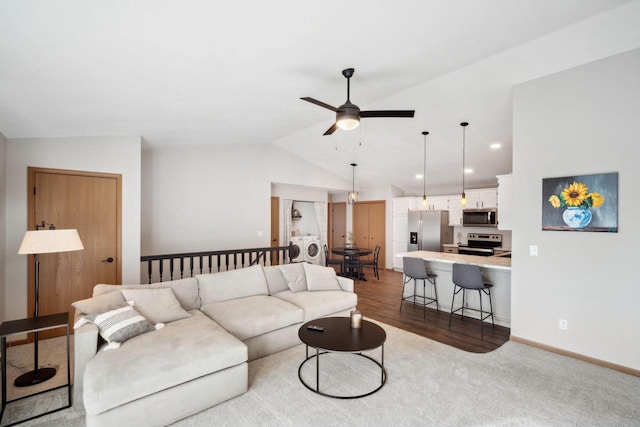 living area with light wood-type flooring, lofted ceiling, a ceiling fan, recessed lighting, and baseboards