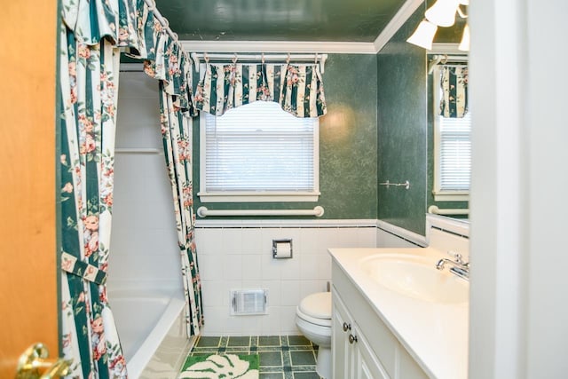 bathroom with visible vents, toilet, ornamental molding, shower / bath combination with curtain, and vanity