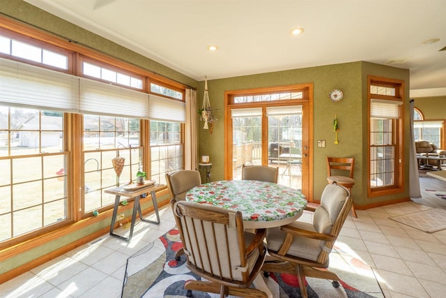 dining room featuring light tile patterned floors, recessed lighting, and baseboards