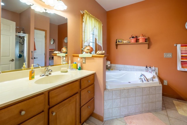 bathroom with tile patterned flooring, a shower stall, a bath, and vanity