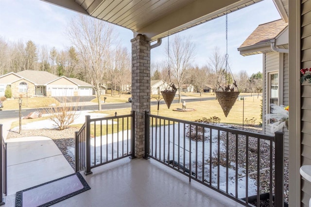 balcony featuring a residential view