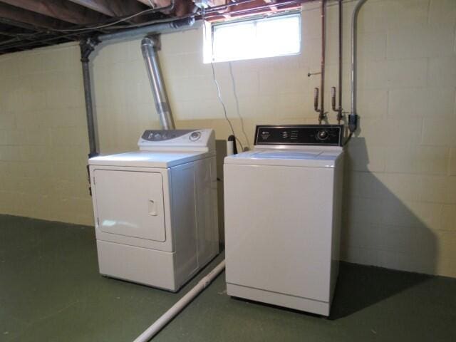 laundry area with washing machine and dryer and laundry area