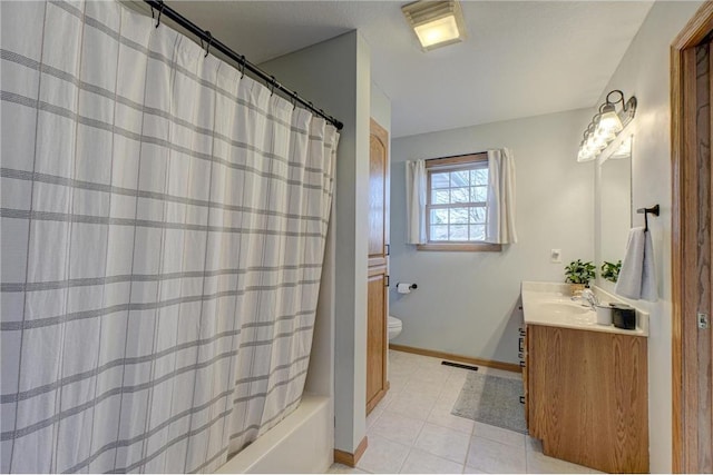 full bath featuring visible vents, toilet, tile patterned flooring, baseboards, and vanity