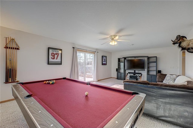 recreation room featuring baseboards, light colored carpet, ceiling fan, and pool table