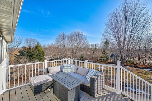 wooden deck with an outdoor hangout area