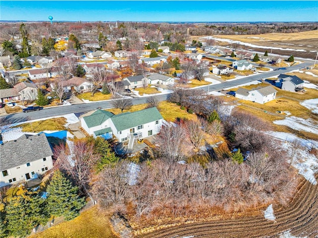 birds eye view of property with a residential view