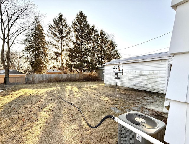 view of yard with cooling unit and fence private yard