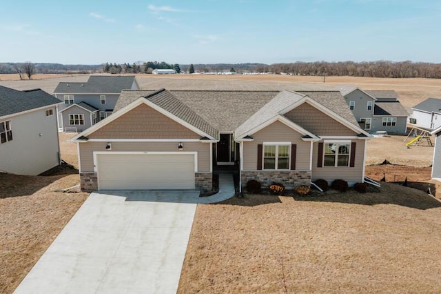 craftsman-style home with an attached garage, a residential view, stone siding, and driveway