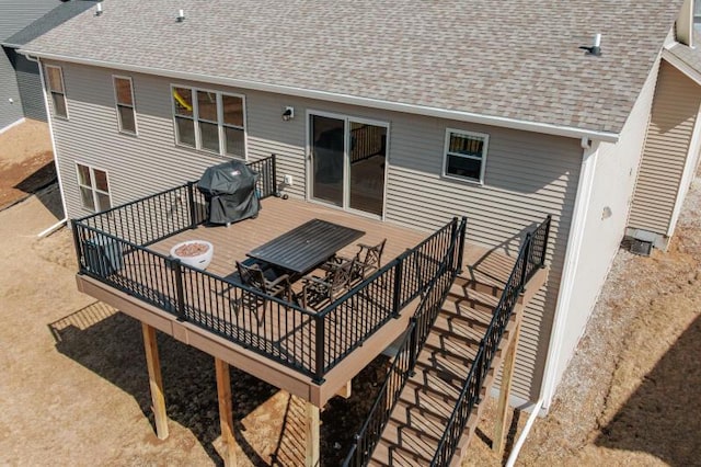 wooden deck featuring grilling area