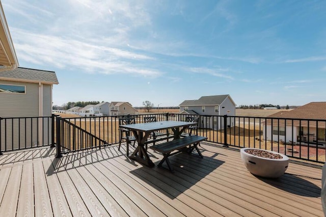 wooden deck featuring a residential view