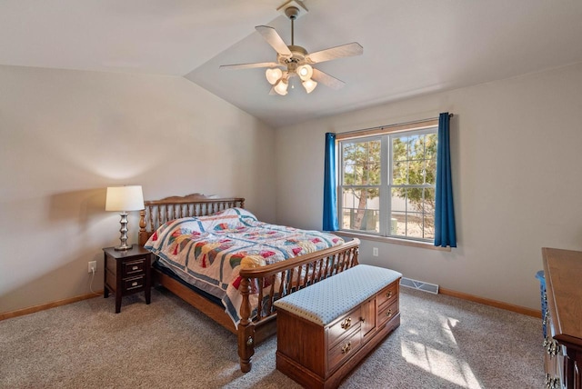 carpeted bedroom featuring visible vents, ceiling fan, baseboards, and lofted ceiling