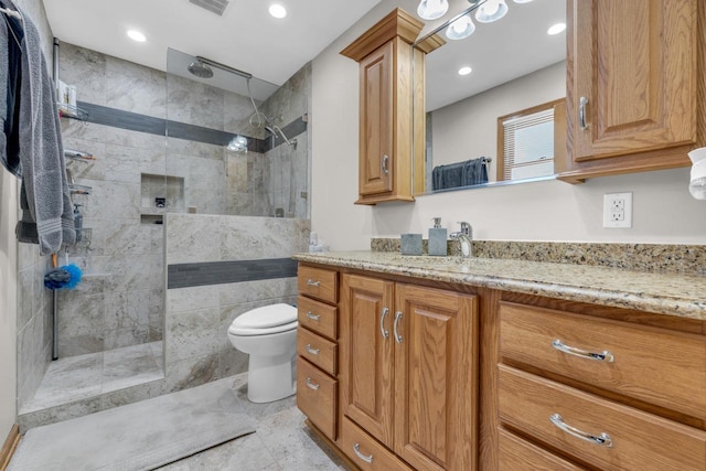 full bath with vanity, visible vents, recessed lighting, a walk in shower, and toilet