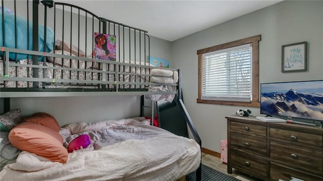 bedroom featuring baseboards