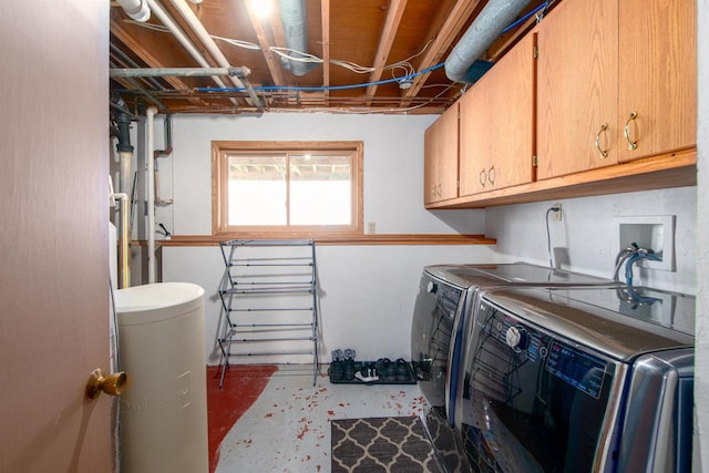 laundry room with cabinet space and independent washer and dryer