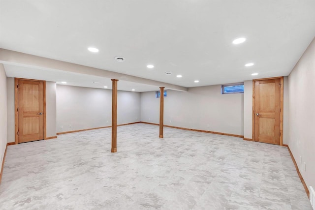 finished basement with recessed lighting and baseboards