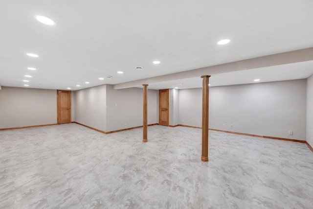 finished basement with recessed lighting and baseboards