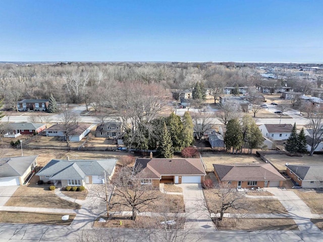 birds eye view of property with a residential view