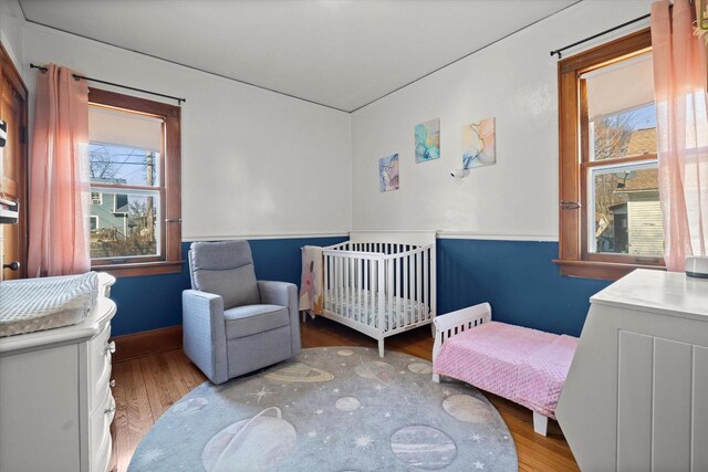 bedroom with wood finished floors