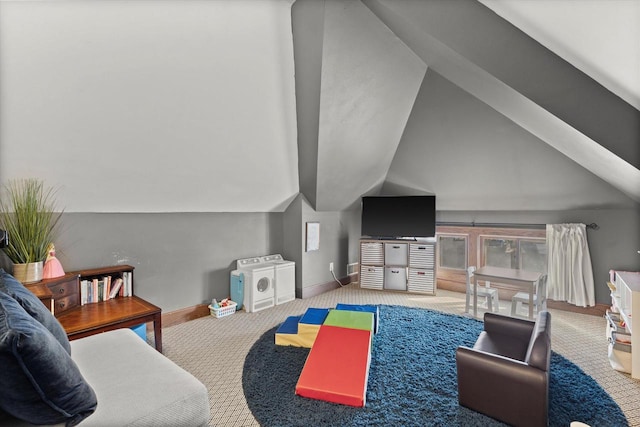 living area featuring vaulted ceiling, baseboards, and carpet floors