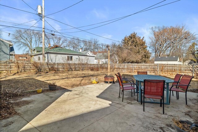 view of patio / terrace featuring outdoor dining area and a fenced backyard