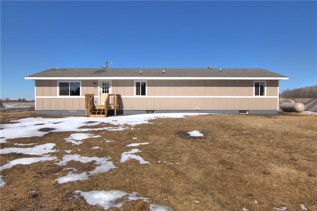 view of front of house with roof with shingles