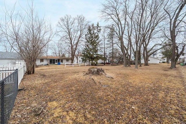 view of yard featuring fence