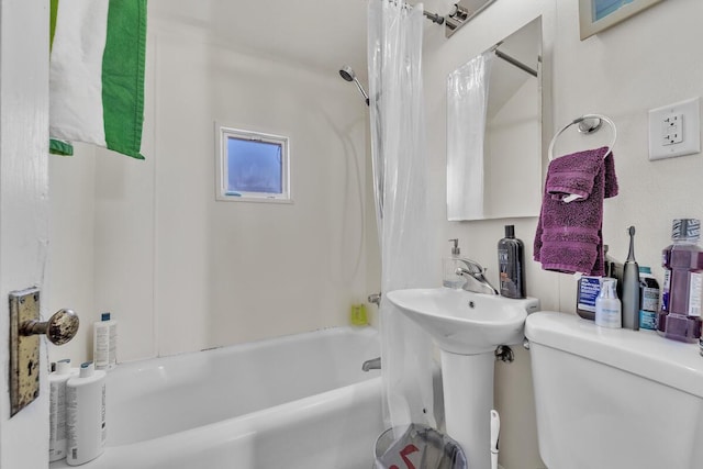 full bathroom with toilet and shower / tub combo with curtain