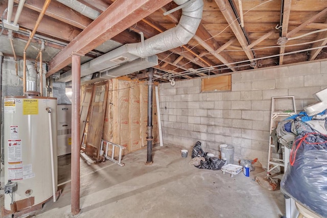 unfinished basement with water heater and visible vents