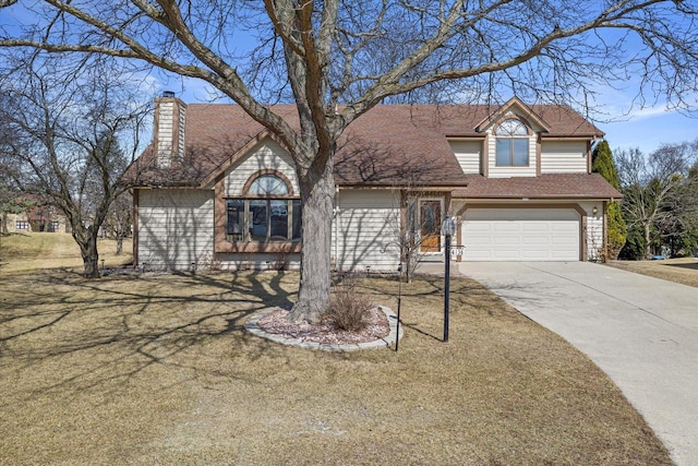 traditional home with a shingled roof, concrete driveway, a garage, and a chimney