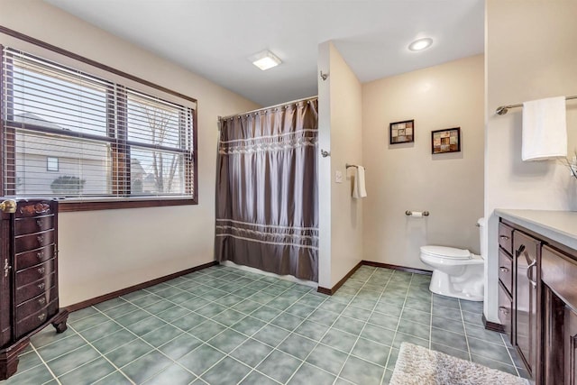 full bath with baseboards, toilet, a shower with curtain, tile patterned floors, and vanity