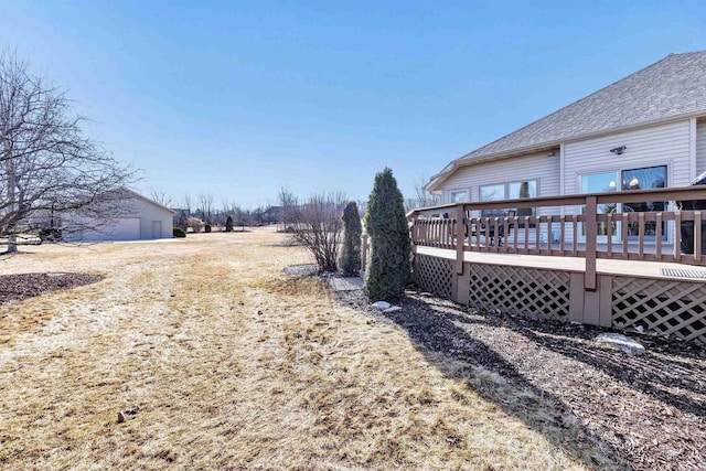 view of yard with a deck