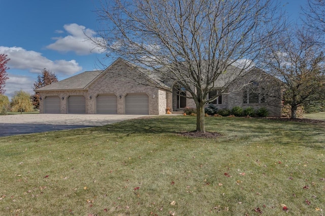 french country inspired facade featuring a front lawn, brick siding, a garage, and driveway