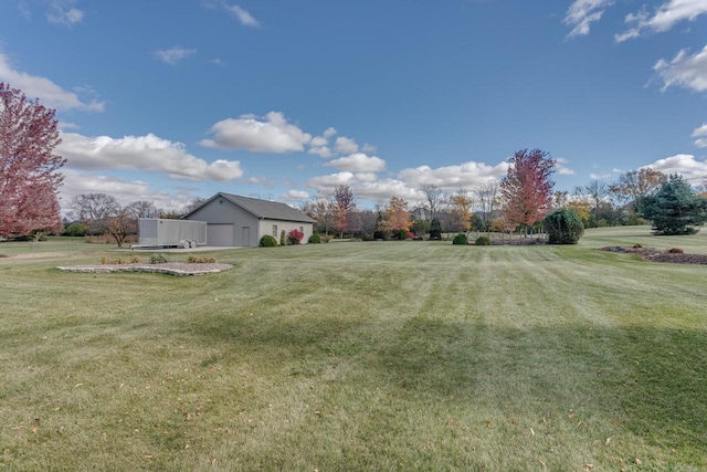 view of yard featuring a garage