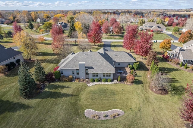 birds eye view of property with a residential view