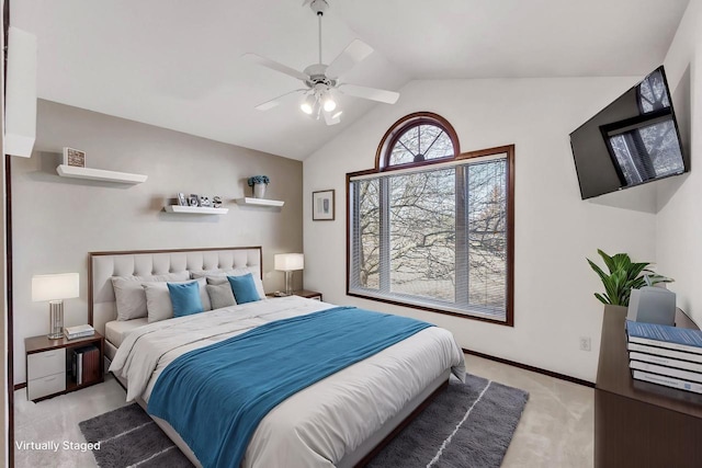 bedroom featuring lofted ceiling, a ceiling fan, baseboards, and light carpet