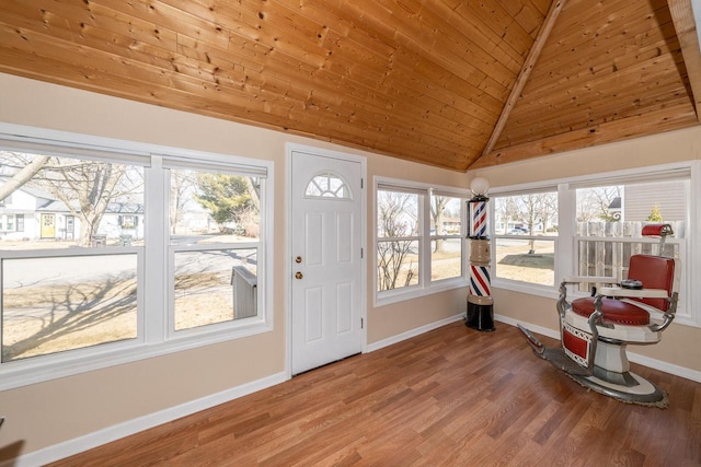 sunroom with wood ceiling and vaulted ceiling