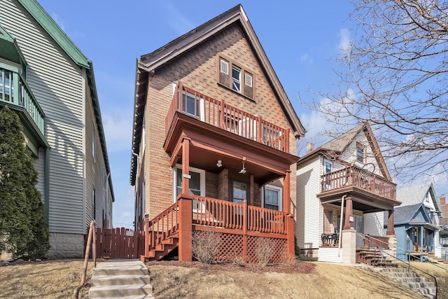 view of front of home with a balcony