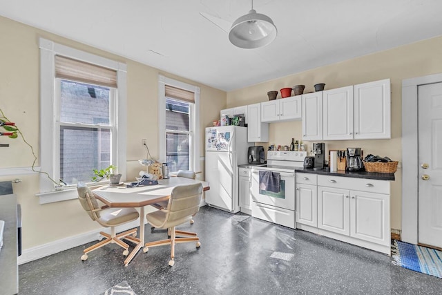 kitchen featuring white cabinetry, white appliances, dark countertops, and baseboards