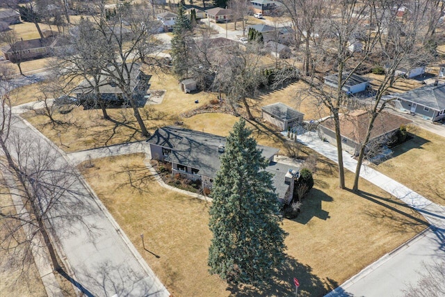 birds eye view of property with a residential view