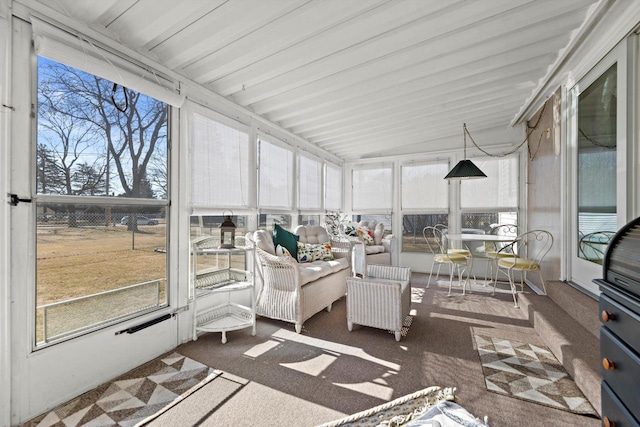 sunroom with lofted ceiling